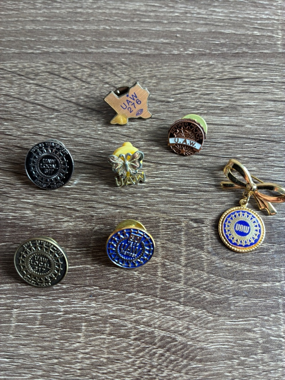 7 Collectible Vintage UAW Enamel Lapel Pins - Blue, Gold, Black Assorted
